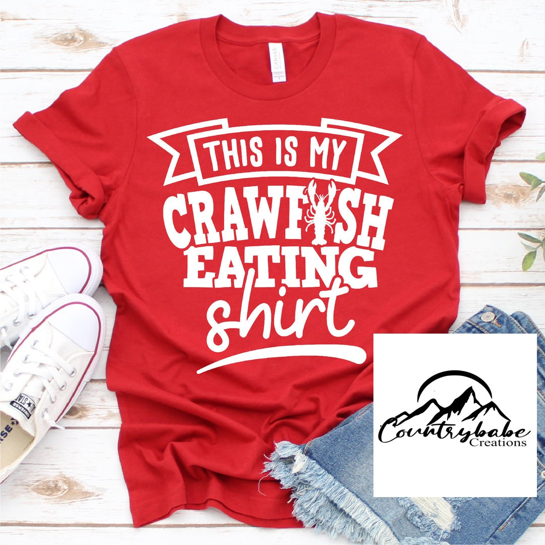 My crawfish wearing shirt